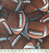 Fleece Packed Footballs Allover Sports Brown Fleece Fabric Print BTY A409.40