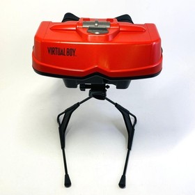 Nintendo Virtual Boy console, 3 games, and AC adapter/tap included.