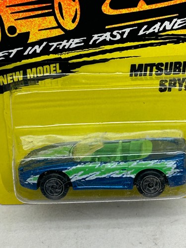 1994 MATCHBOX SUPERFAST #28 BLUE MITSUBISHI SPYDER NEW ON CARD - Picture 5 of 7