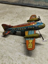 Vintage Tin  Penny Toy Airplane - Overseas Air Lines N-105  Pan Am Logo - Japan
