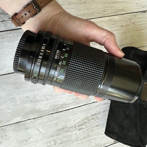 OBIETTIVO CANON FD 200 MM 1:4 VINTAGE USATO OBIETTIVO NERO CON TAPPO E CUSTODIA - Foto 5 di 14