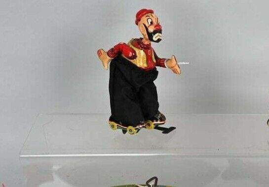 Vintage Japan Tin Litho Roller Skater Hobo Clown Wind-up Toy Vintage Japan Tin Litho Roller Skater Hobo Clown Wind-up Toy