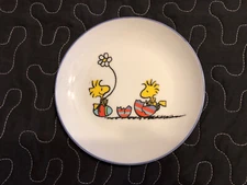 2021 PEANUTS WORLDWIDE LLC Snoopy Saucer•Woodstock