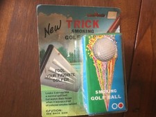 Vtg. Trick smoking  golf ball- colored Powder Smoke on Impact Gag Gift unopened
