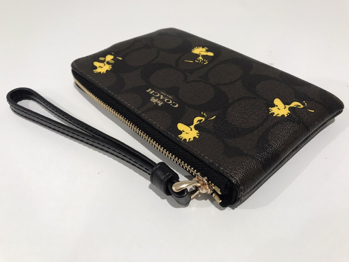 COACH X Peanuts Corner Zip Wristlet In Signature Canvas With