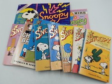 Bundle of 11 Snoopy & Charlie Brown Comic Strip Books by Charles M Schulz