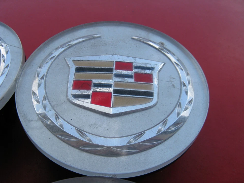 CADILLAC ATS CTS DTS SRX STS XLR XTS TAPACUBOS TAPACUBOS TAPACUBOS CUBIERTA CENTRAL 165 Foto 3 de 4