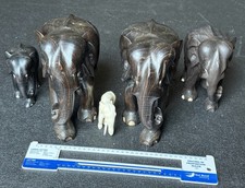 A Rare and Monumental Pair of Hand-Carved Ebony Anglo-Indian Elephant Sculptures