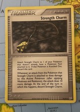 Strength Charm 74/95 Ex Team Magma vs Team Aqua Reverse Holo