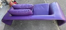 canapé cuir 2 places château d’Ax violet en bon état, hauteur 60cm , largeur 180