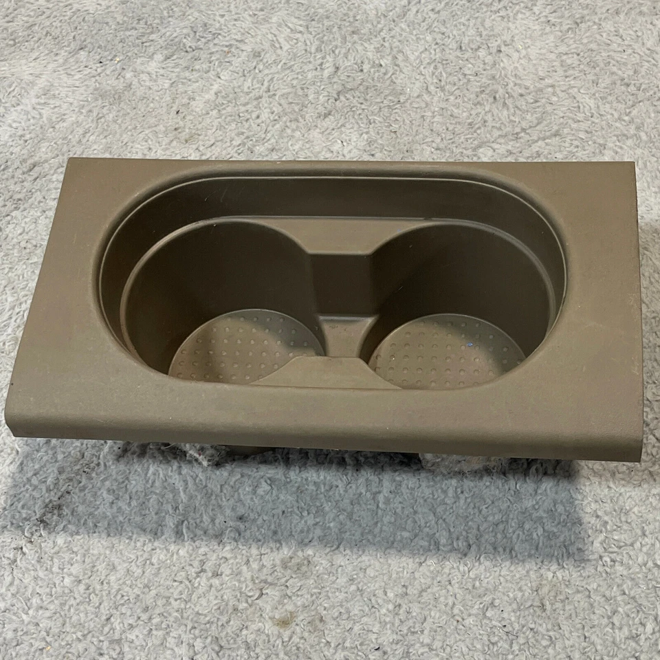 Portavasos consola central delantera Nissan Frontier Xterra 2005-2010 OEM 96931 EA000 Foto 2 de 4