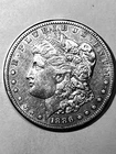 1886 s     MORGAN DOLLAR  RARE AU + REGULAR $285  SELLING $190