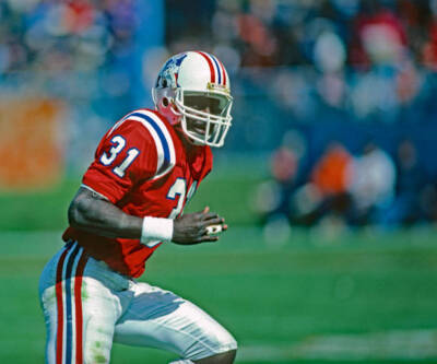 Safety Fred Marion New England Patriots pursues the play during a - Old Photo