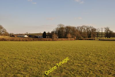 Photo 12x8 Mid Devon : Grassy Field Ash Thomas Heading off of the road and c2013