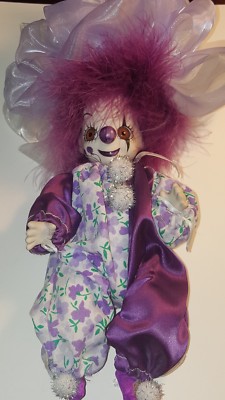 glass clown doll