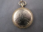 Antique Elgin gold filled pocket watch with stand