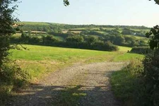 Photo 12x8 Field near Tremeers Manor Lamorick Across the valley on the rig c2016