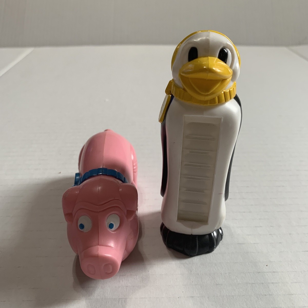 Vtg 1998 PEZ dispenser Pink Pig USA & Peez Penguin | eBay