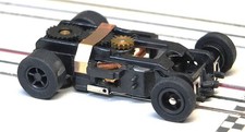 Auto World X-Traction HO Slot Car Chassis - Black Hubs and Blk Wall Tires  New