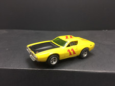 Aurora AFX DODGE CHARGER STOCK CAR - Yellow Black Red HO Slot Car