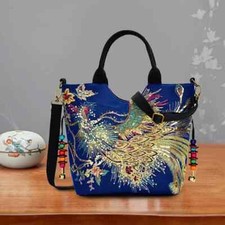 Embroidered Sequins Retro Handbag with strap and double handles.