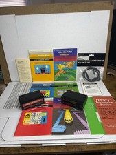 Lot of 4 Texas Instruments TI-99/4A Computer Game Cartridges w/ Manuals UNTESTED