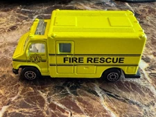 MAISTO Fire Rescue Truck Yellow Diecast Truck.