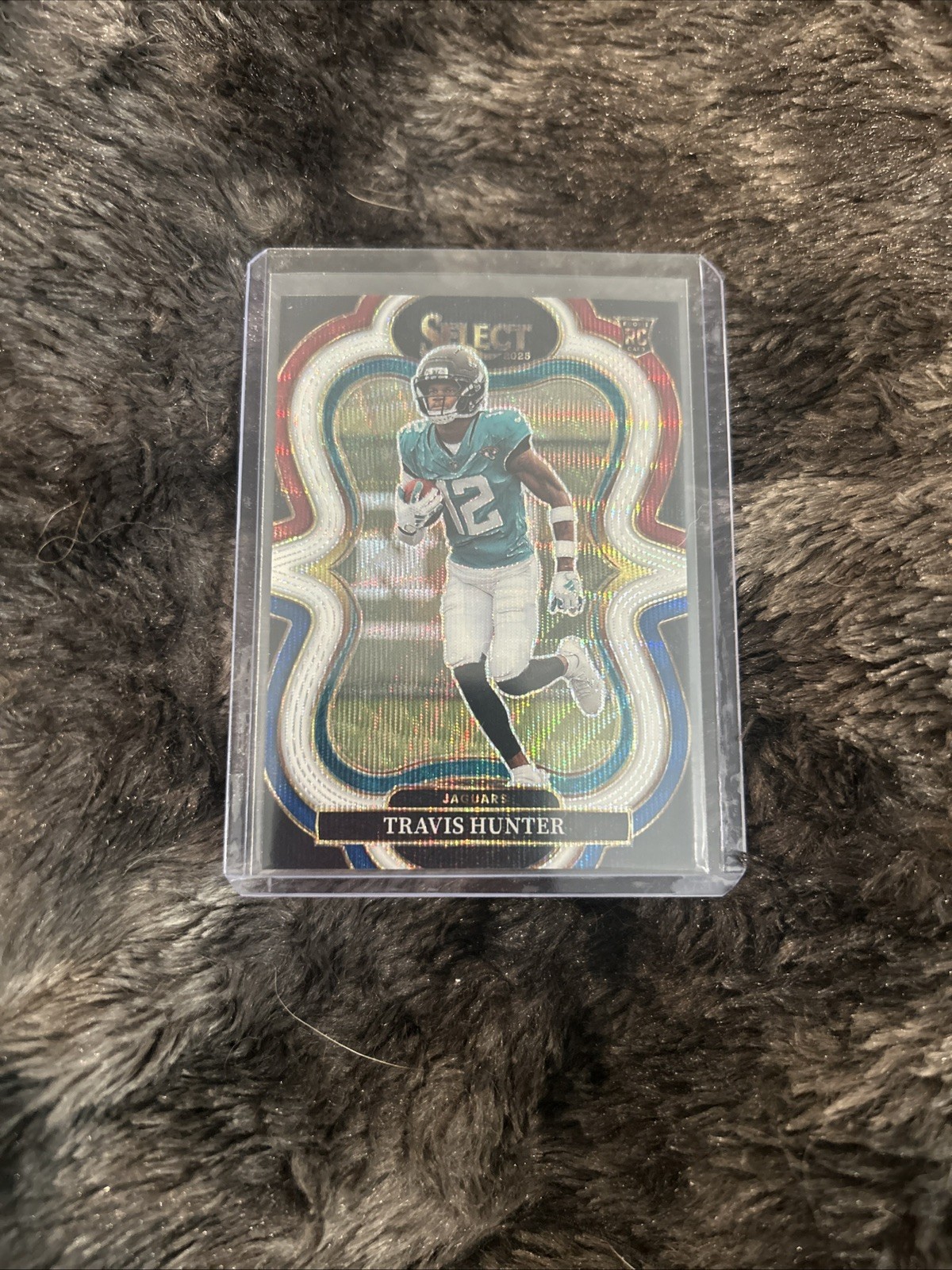 TRAVIS HUNTER 2025 SELECT SUITE LEVEL ROOKIE TRI-COLOR RC #/199