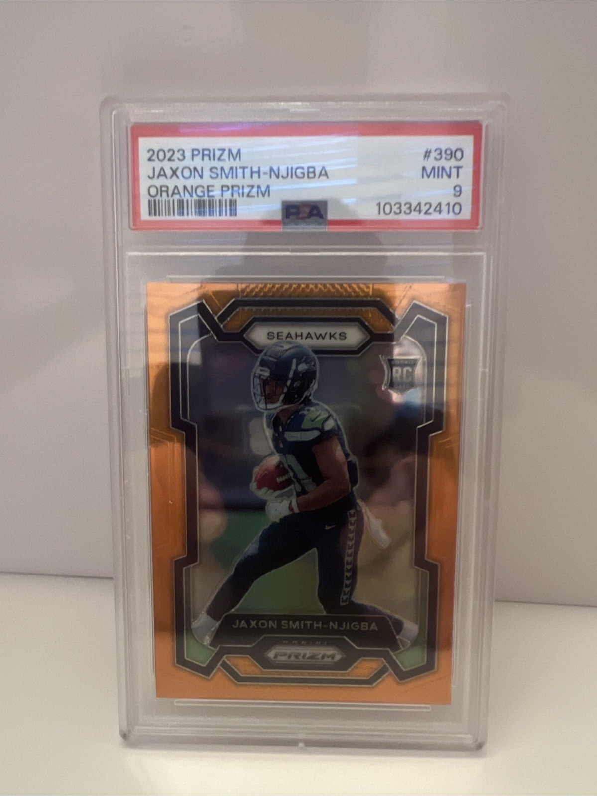 2023 Panini Prizm - Rookies Jaxon Smith-Njigba #390 Orange Prizm /249 (RC)