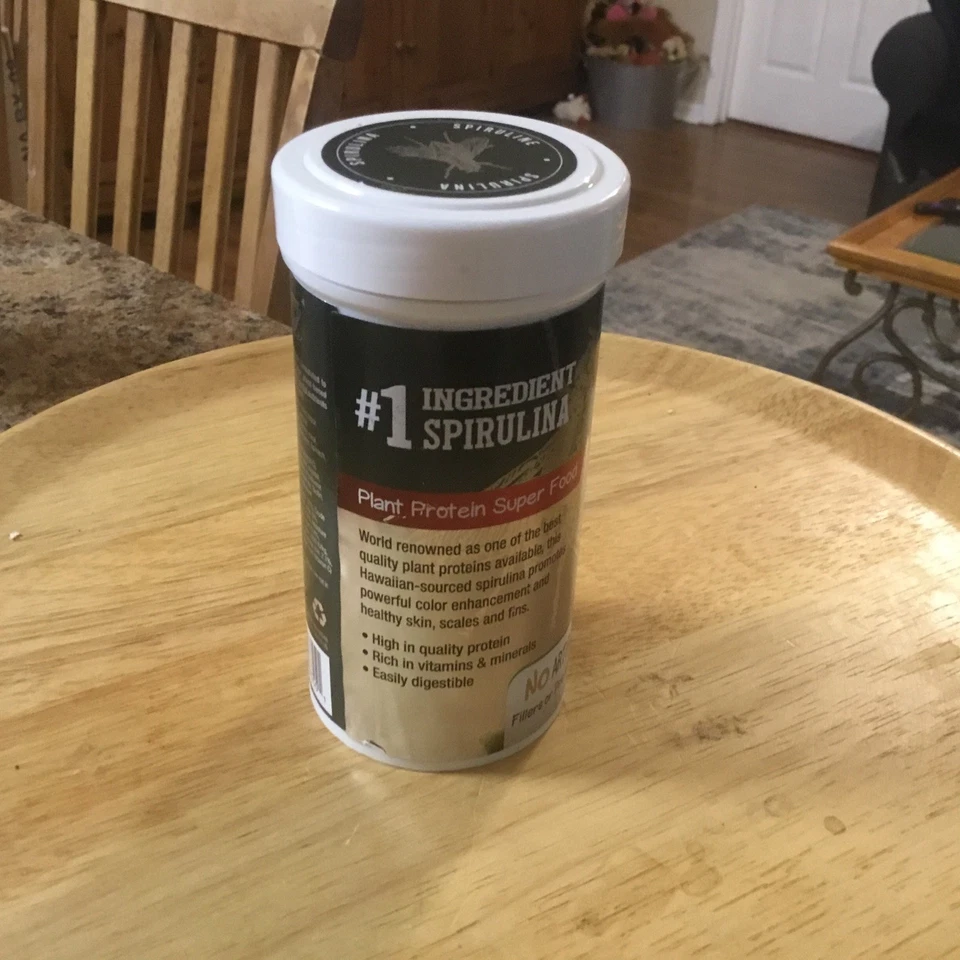 Comida para peces Fluval Bug Bites Spirulina Flakes 1,59 oz nueva sellada envío gratuito Foto 3 de 4