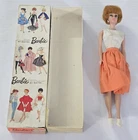 X-845 VINTAGE 1960'S MATTEL BARBIE TITIAN BUBBLE CUT DOLL WITH TAGGED CLOTHING