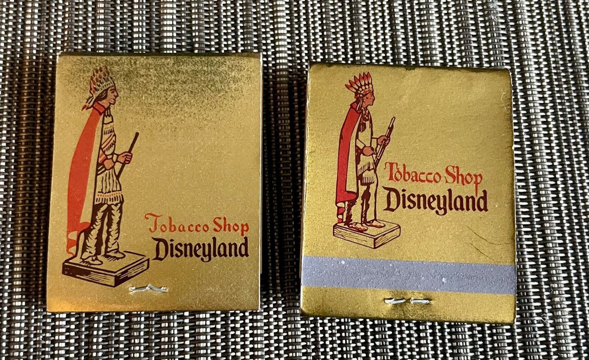 disneyland tobacco tin Pipe A small assortment of Disneyland