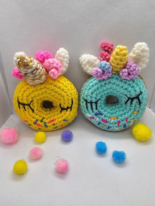 Handmade crochet set of 2 unicorn doughnuts.Adorable and one of a kind.
