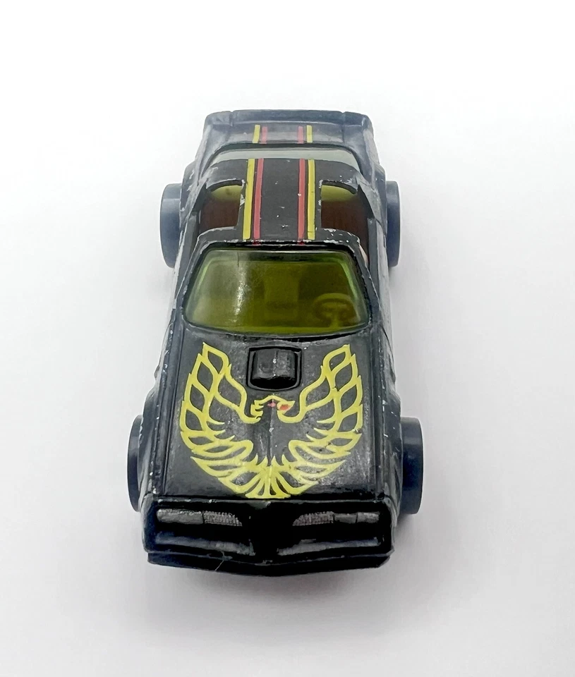Hot Wheels 1977 Black Hot Bird Pontiac Trans Am RARO (vidrio amarillo) Foto 3 de 4
