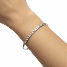 Silver 925 Classic Slave Bangle With A Lovely Diamond Shaped Hammered Finish.