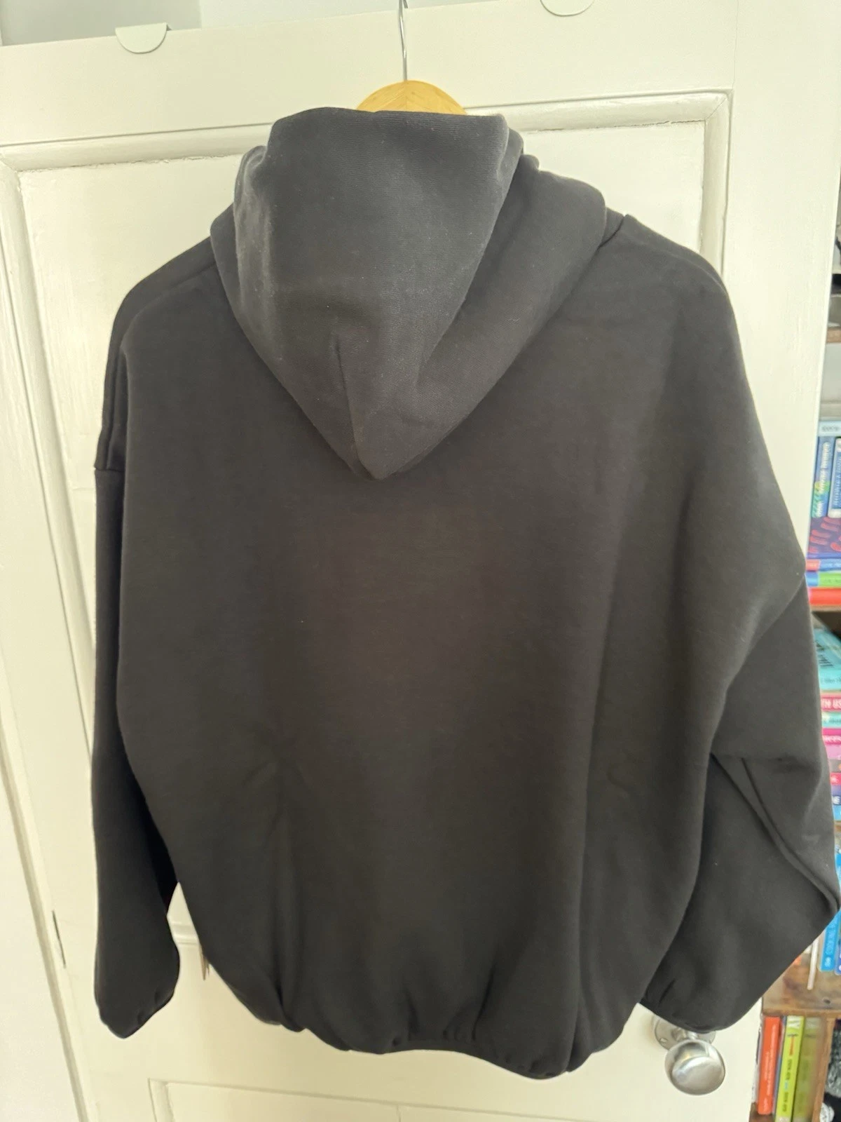 Felpa con cappuccio Fear of God Essentials nera piccola nuova