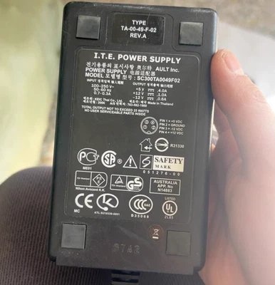 I.T.E. Power Supply TYPE TA-00-49-F-02 REV.A 4-pin Adapter Ladegerät - Bild 1 von 3