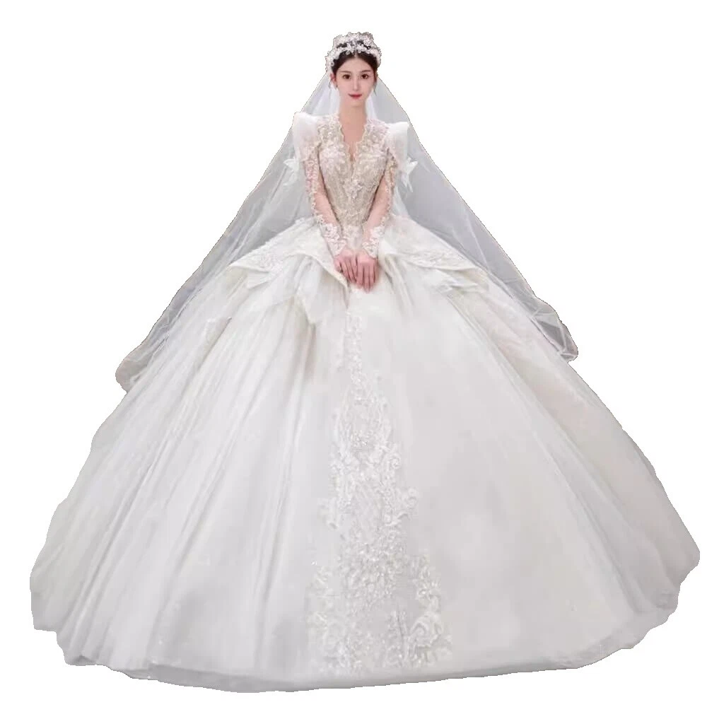 Trompeta y sirena con volados manga larga vestidos de novia