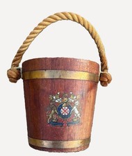 Antique bucket with naval crest
