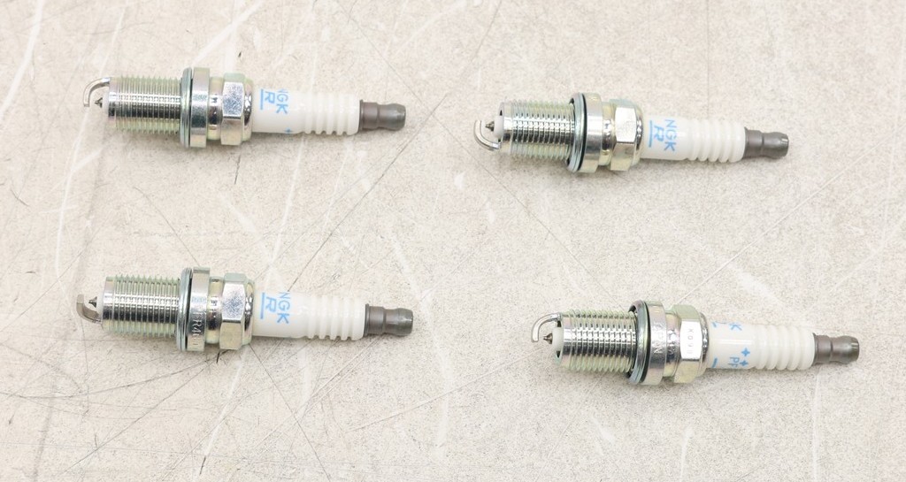 NEW OEM Spark Plugs Set of 4 224011P114 for Maxima Frontier Quest Xterra 92-04