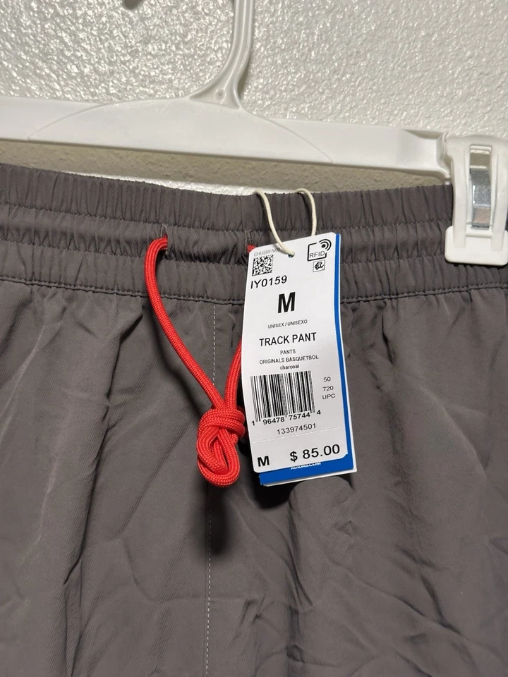 Pantalones de chándal Adidas tejidos talla M para hombre gris amarillo logotipo del trébol baloncesto IY0159 Foto 3 de 4