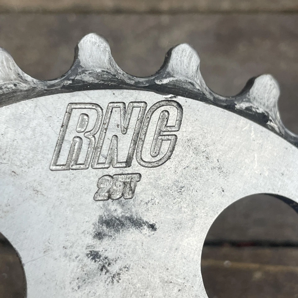 Plato piñón RNC 25T BMX no ferroso posiblemente titanio 85 g vieja escuela Foto 2 de 4