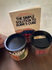 Two Boxed Rubiks Cubes With Manual