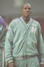 Guard Tony Delk Charlotte Hornets stands on the court before a gam- Old Photo