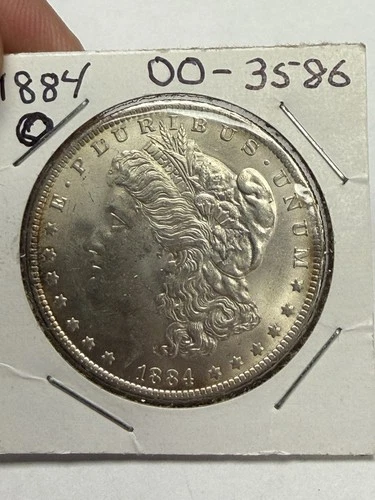 1884 O Morgan Silver Dollar $1 0.9 Fine Silver Coin New Orleans