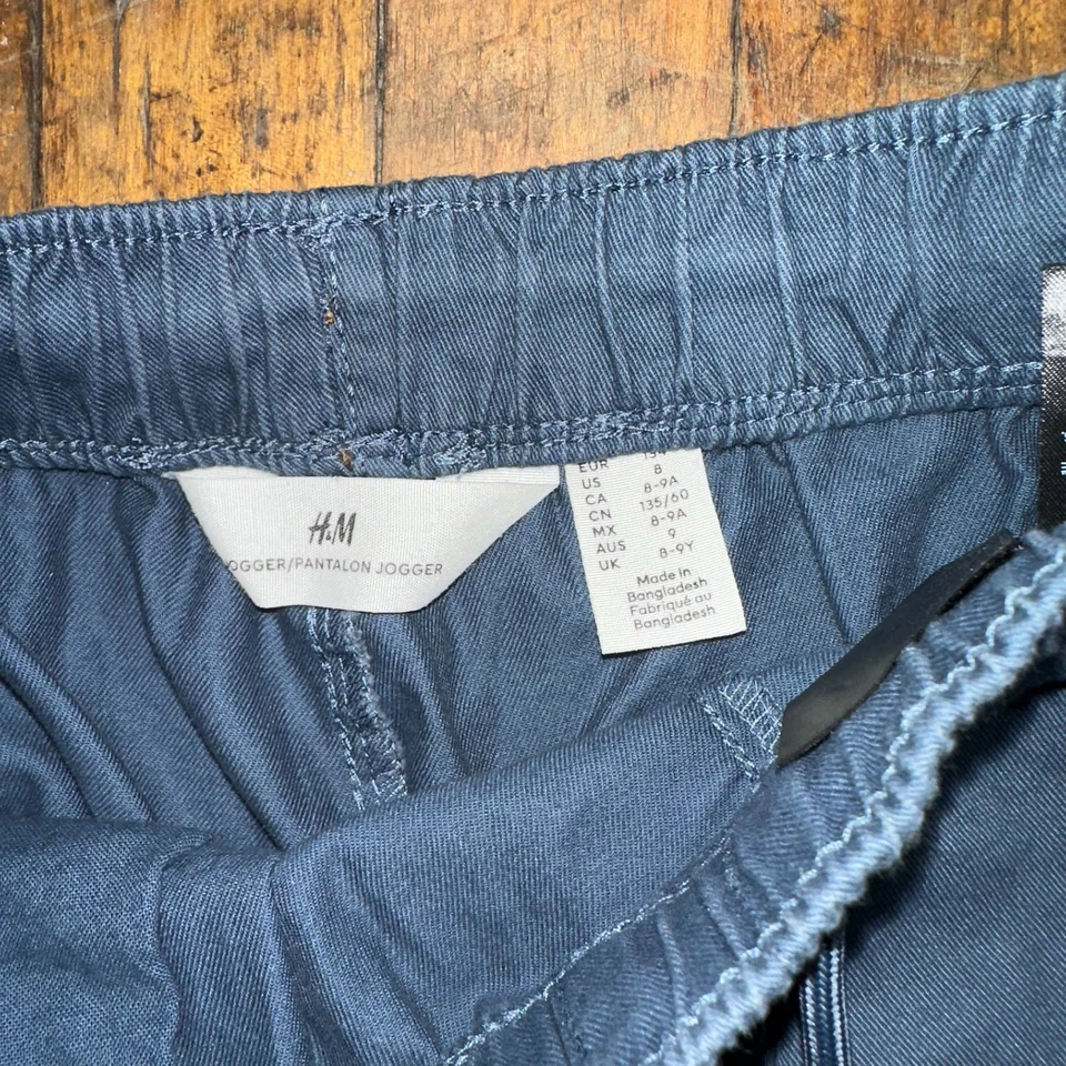 Pantalones Jogger H&M Niñas Talla 8-9Y Azul Pierna Cónica Cortada Bolsillo Cintura Elástica Foto 3 de 4