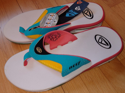 REEF Fanning Sandals Flip Flops Teal Pink Yellow White Bottle Opener