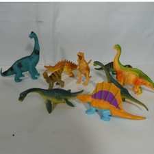 Dinosaurs Random Lot of 9 Plastic Toys