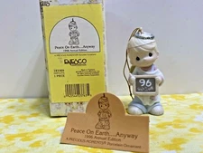 PRECIOUS MOMENTS #183369  1996 Peace On Earth Anyway Ornament Boy dress