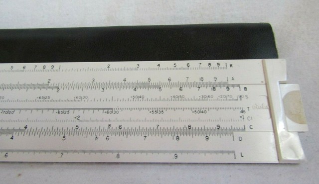 drafting table with slide ruler